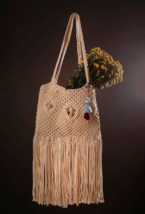 Handcrafted macrame fringe sling bag in natural cotton