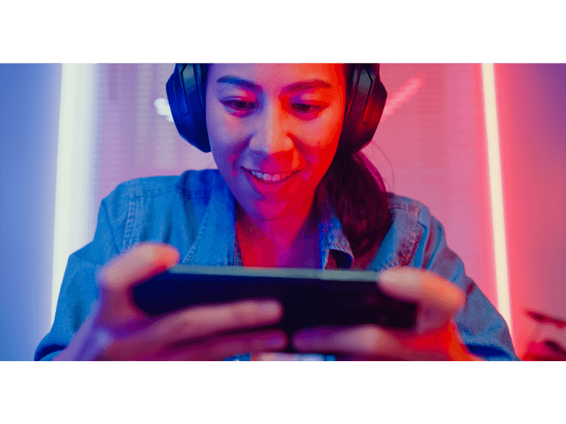 woman on phone with headphones