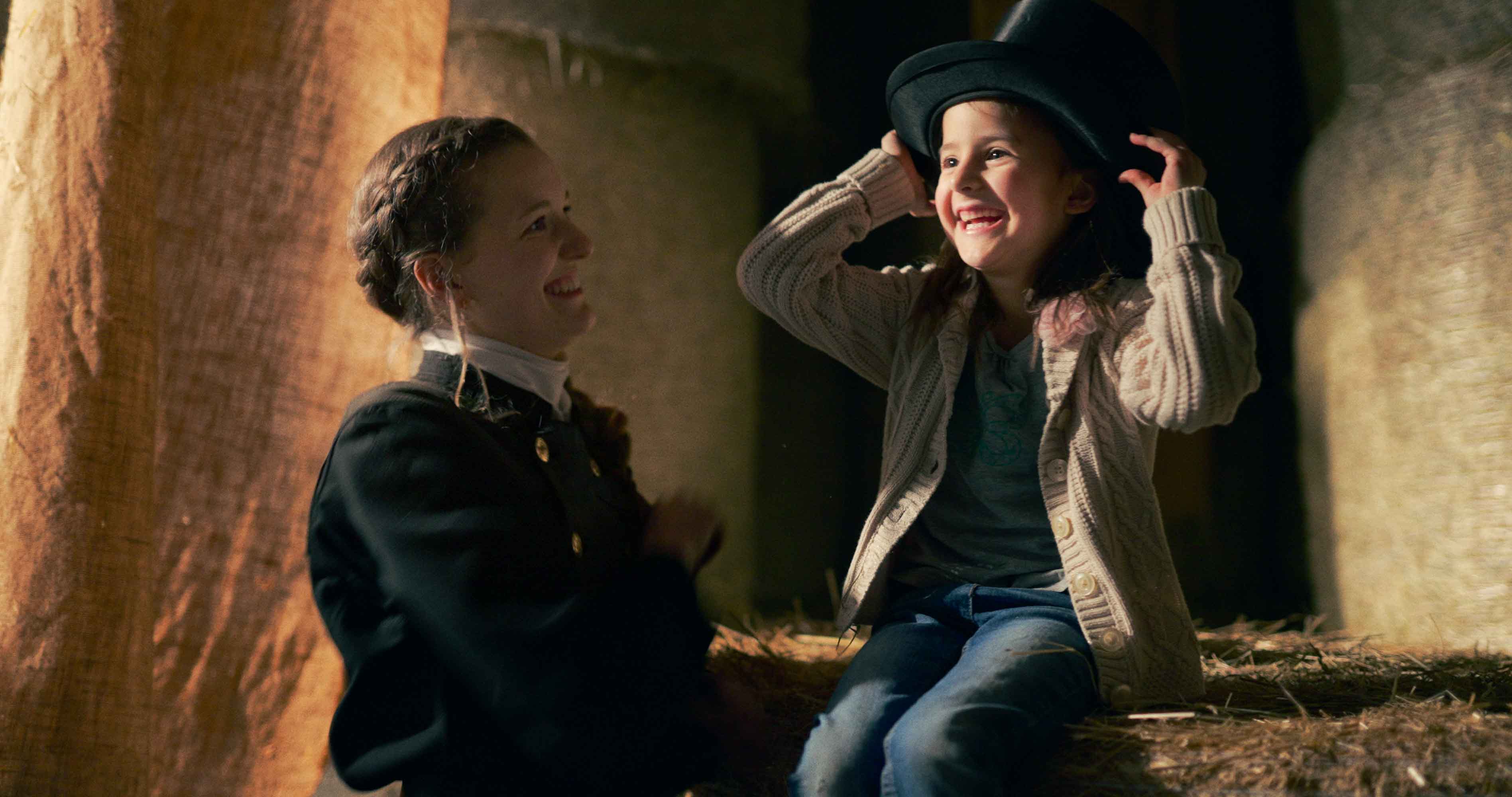 Streetside billboard with flyposters of the Batch.Works brand and illustrations