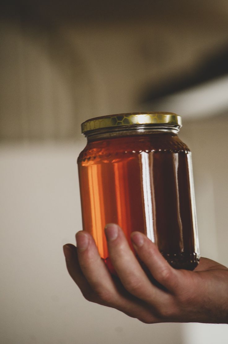 Jar of raw natural honey from local beekeepers
