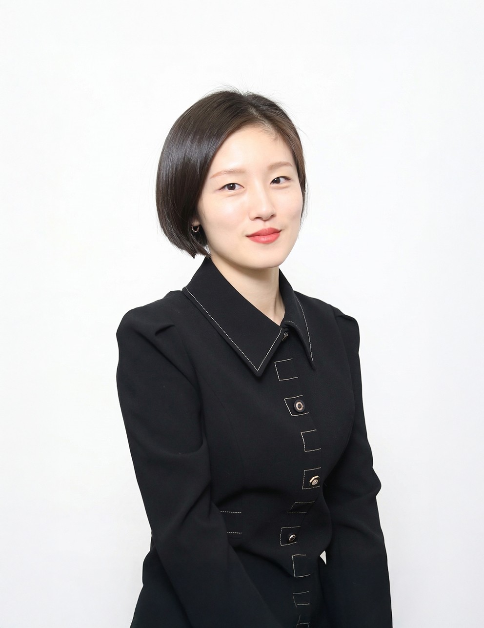 man stranding on straight road photo during daytime