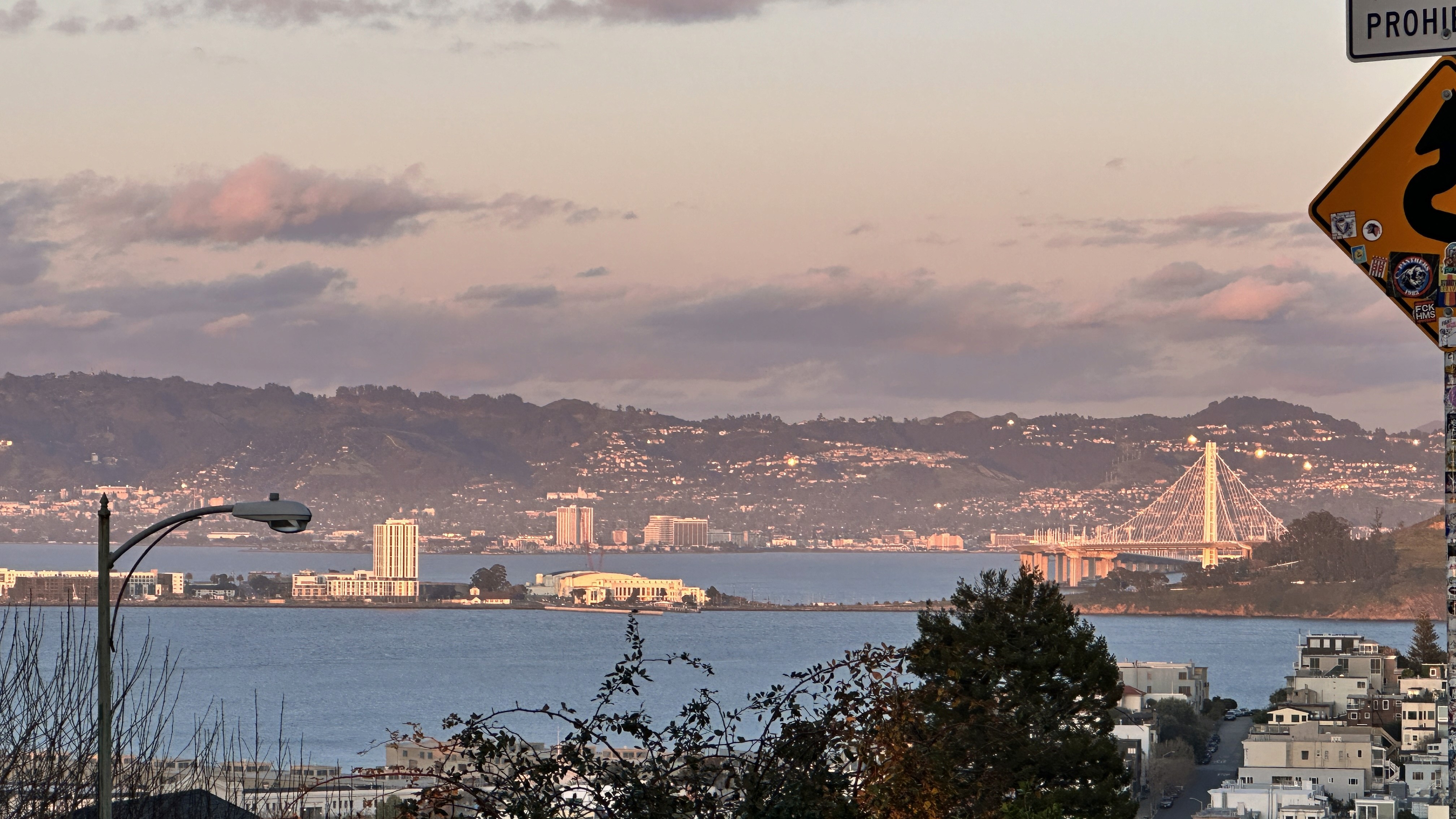 a group of people walking on a sidewalk