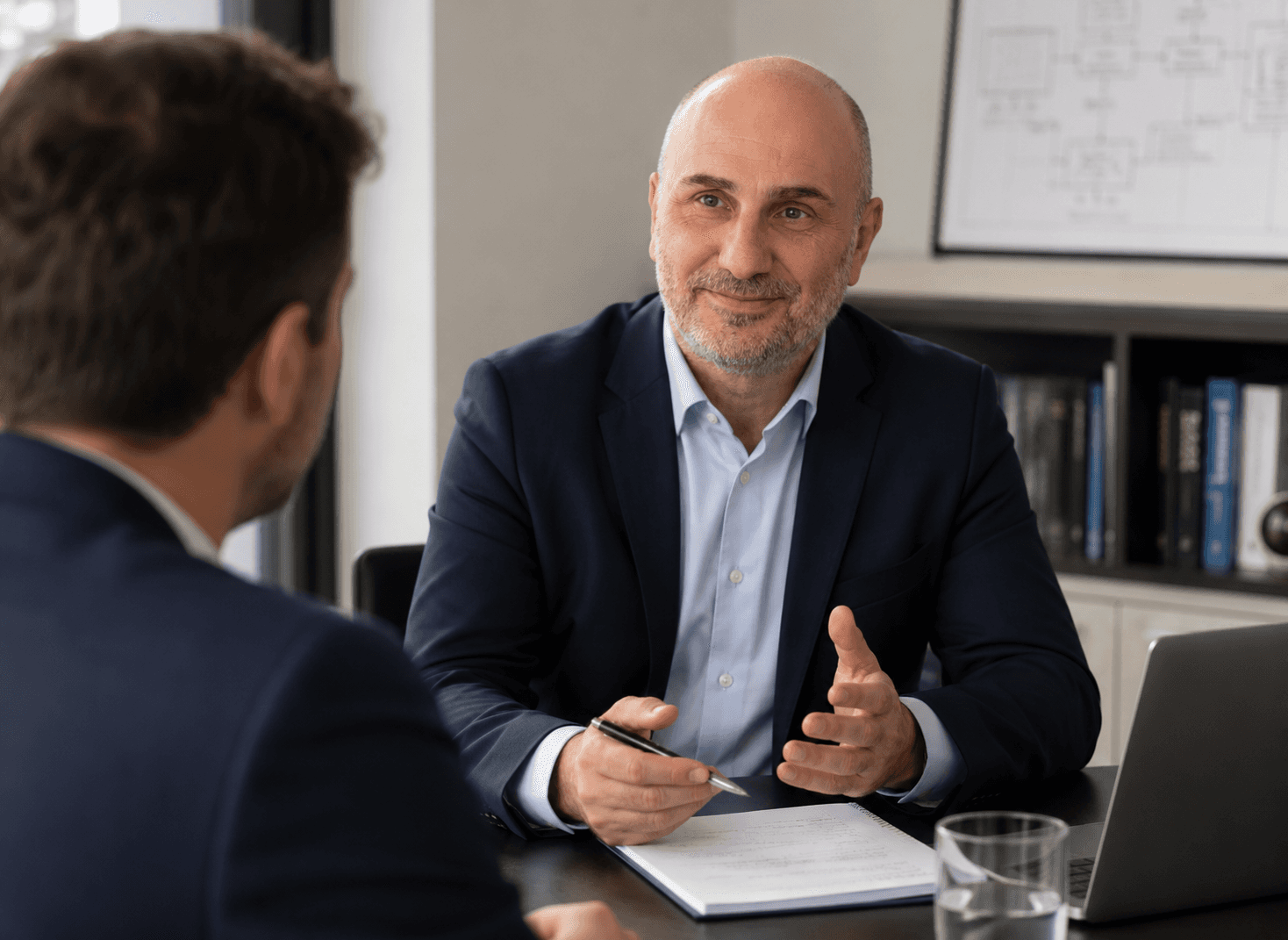 A consultant brainstorming with a manager