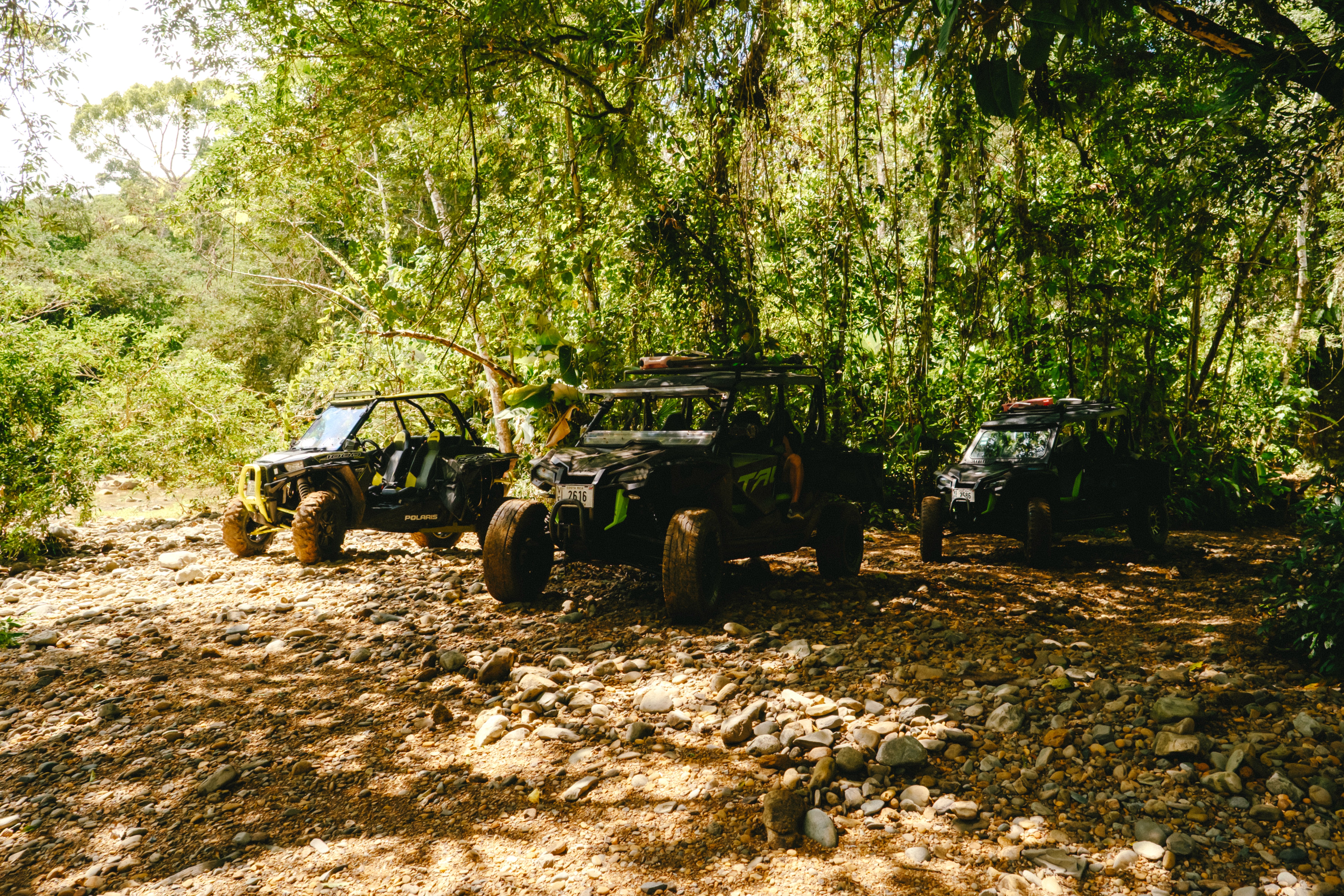 a four wheeler is parked on the beach