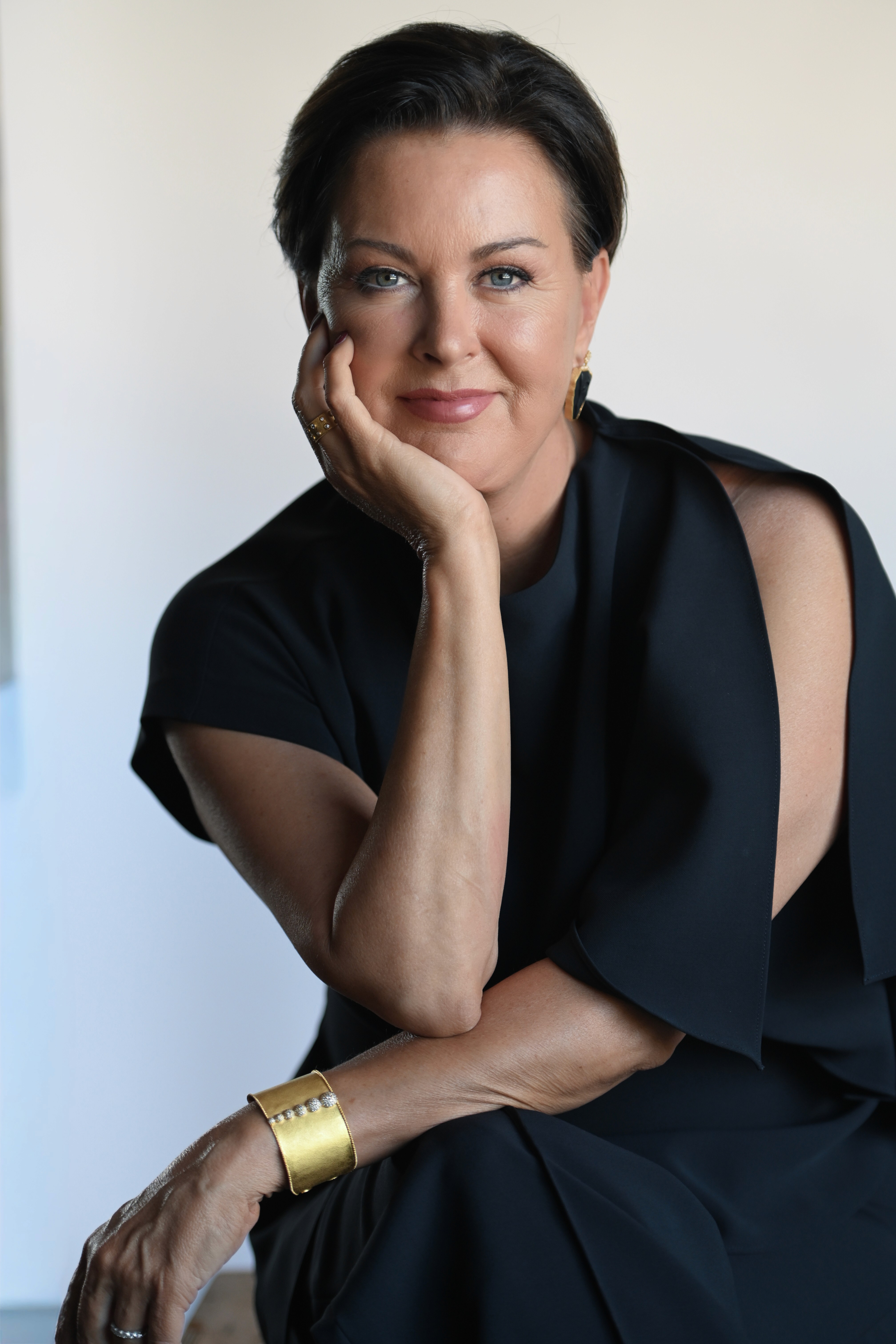 person sitting in a chair in front of a man