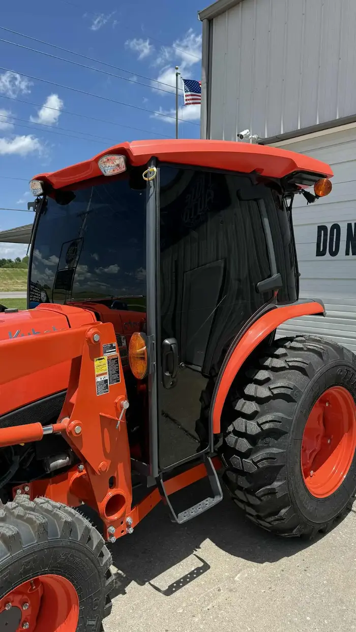 orange tractor with tinted window