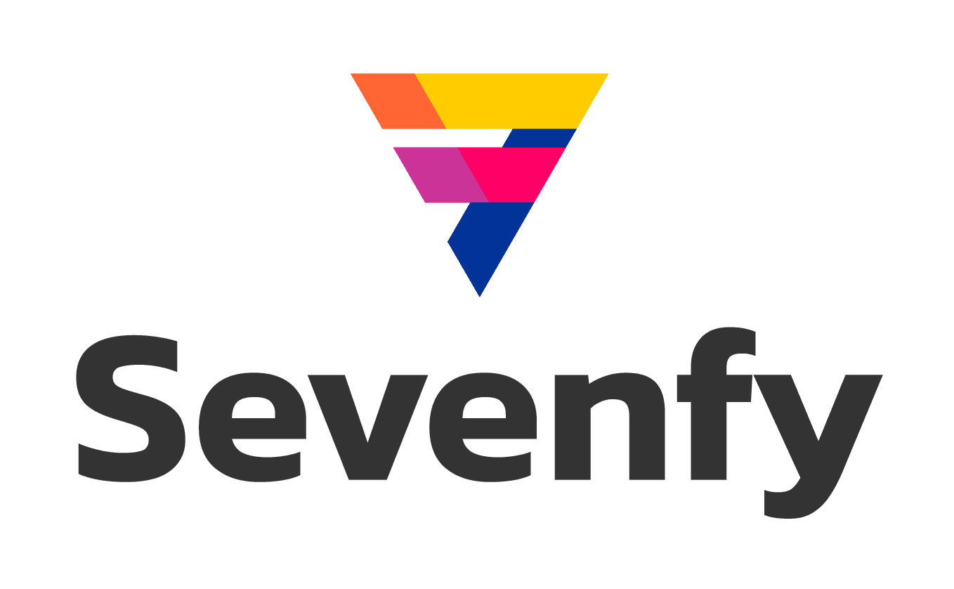 Stone bridge over a waterfall in a forest.