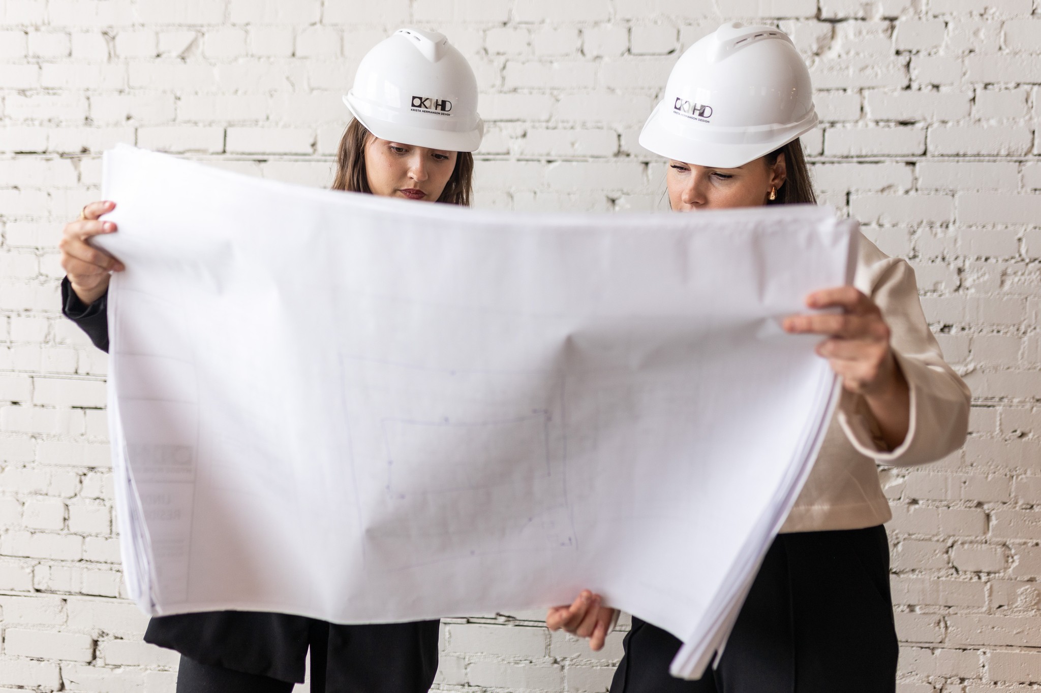 Image of KHD Homes designer working on layout design for home renovations and construction projects with pencil.