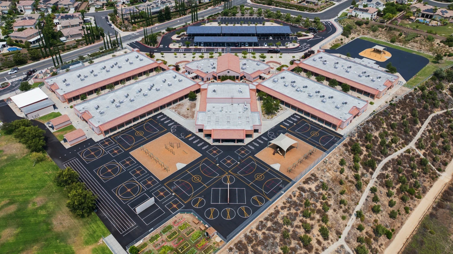 Aerial shot of brand new asphalt school playground