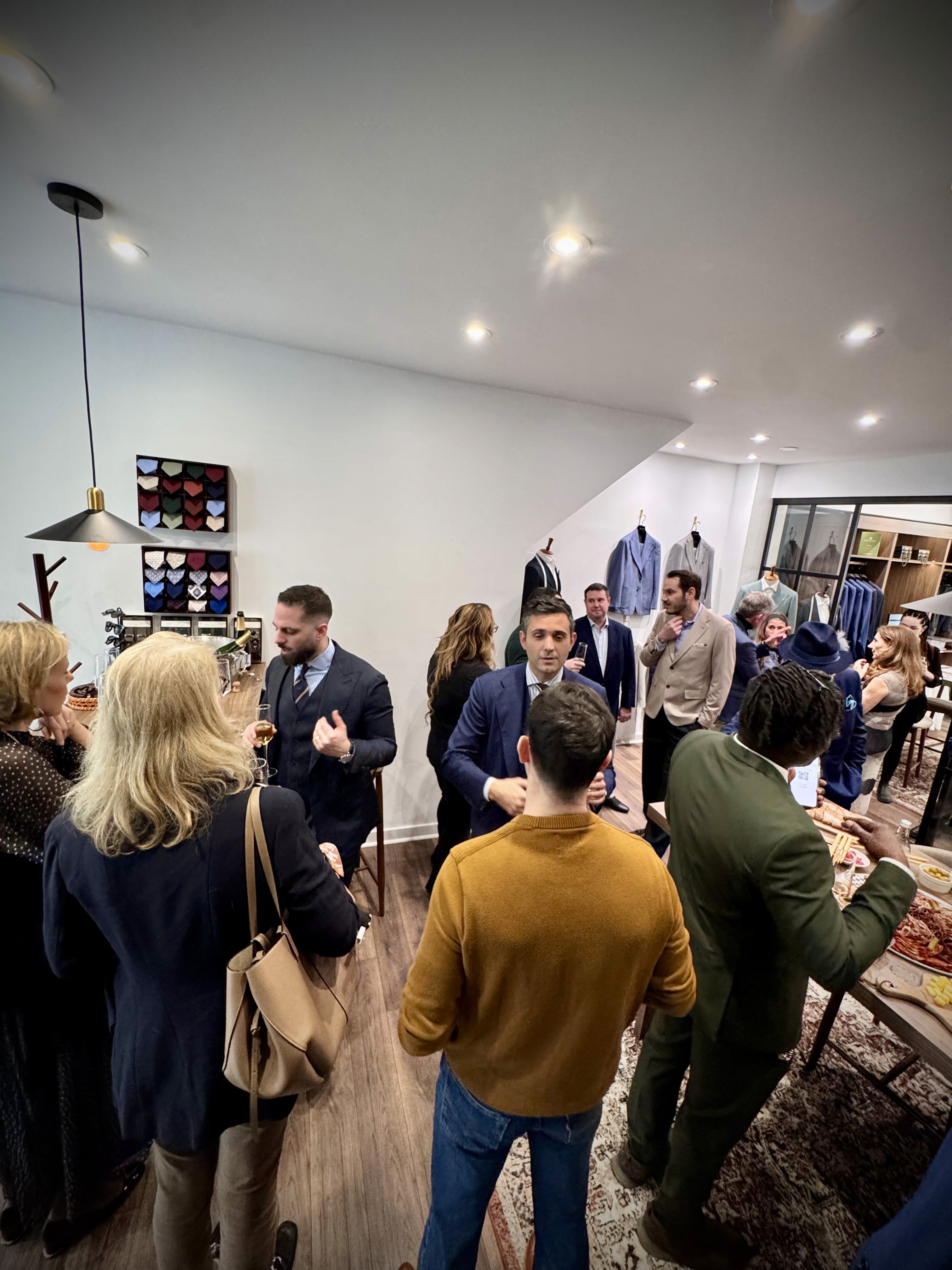 A disco ball hangs from a white ceiling.