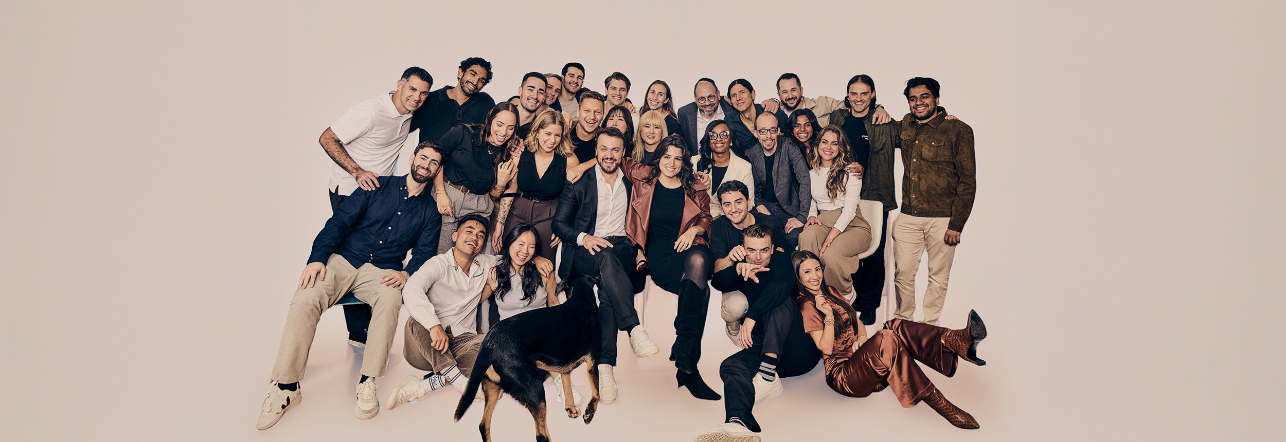 people in a room working exposed brick