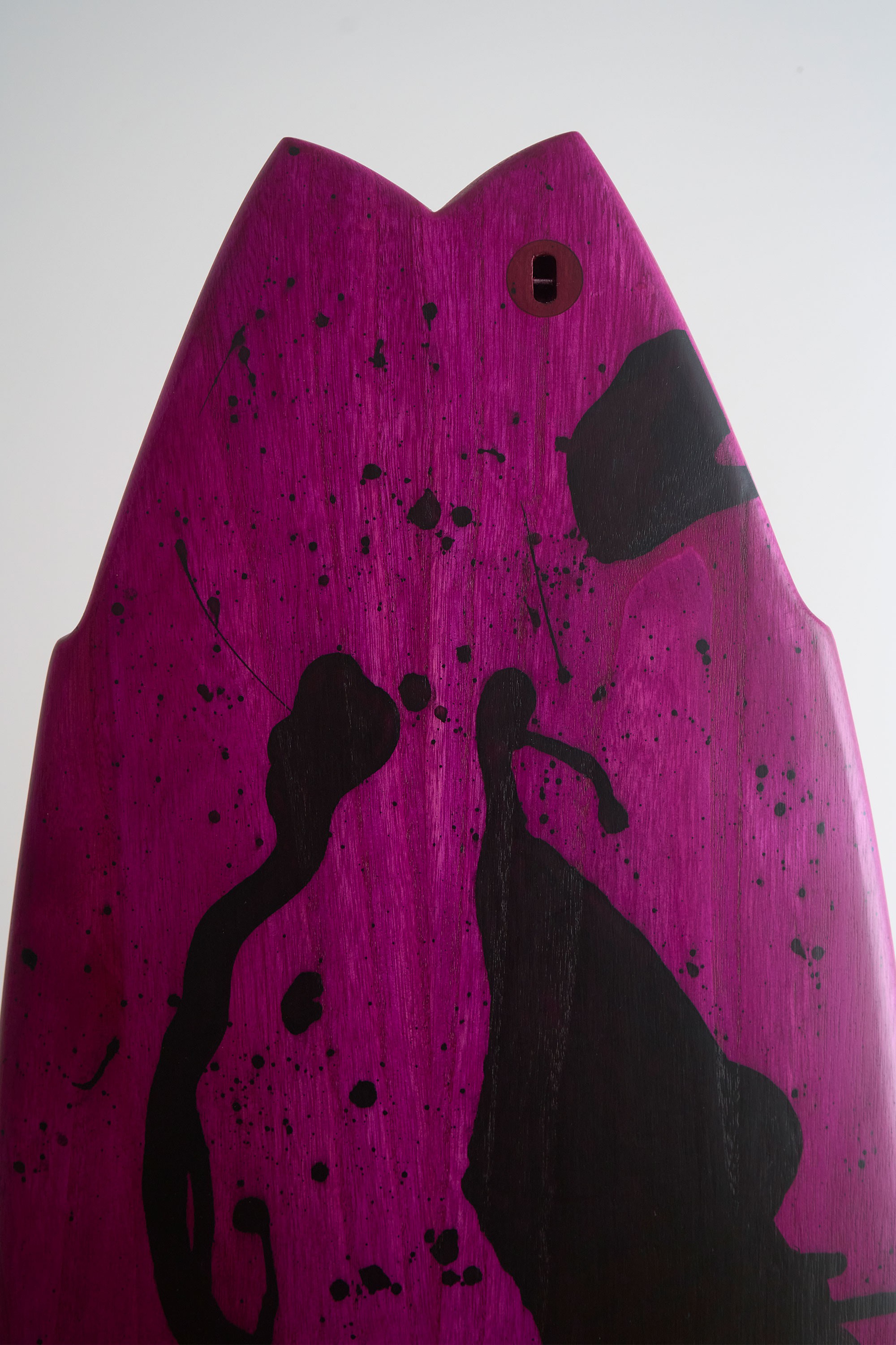 Wooden surfboard with fish tail