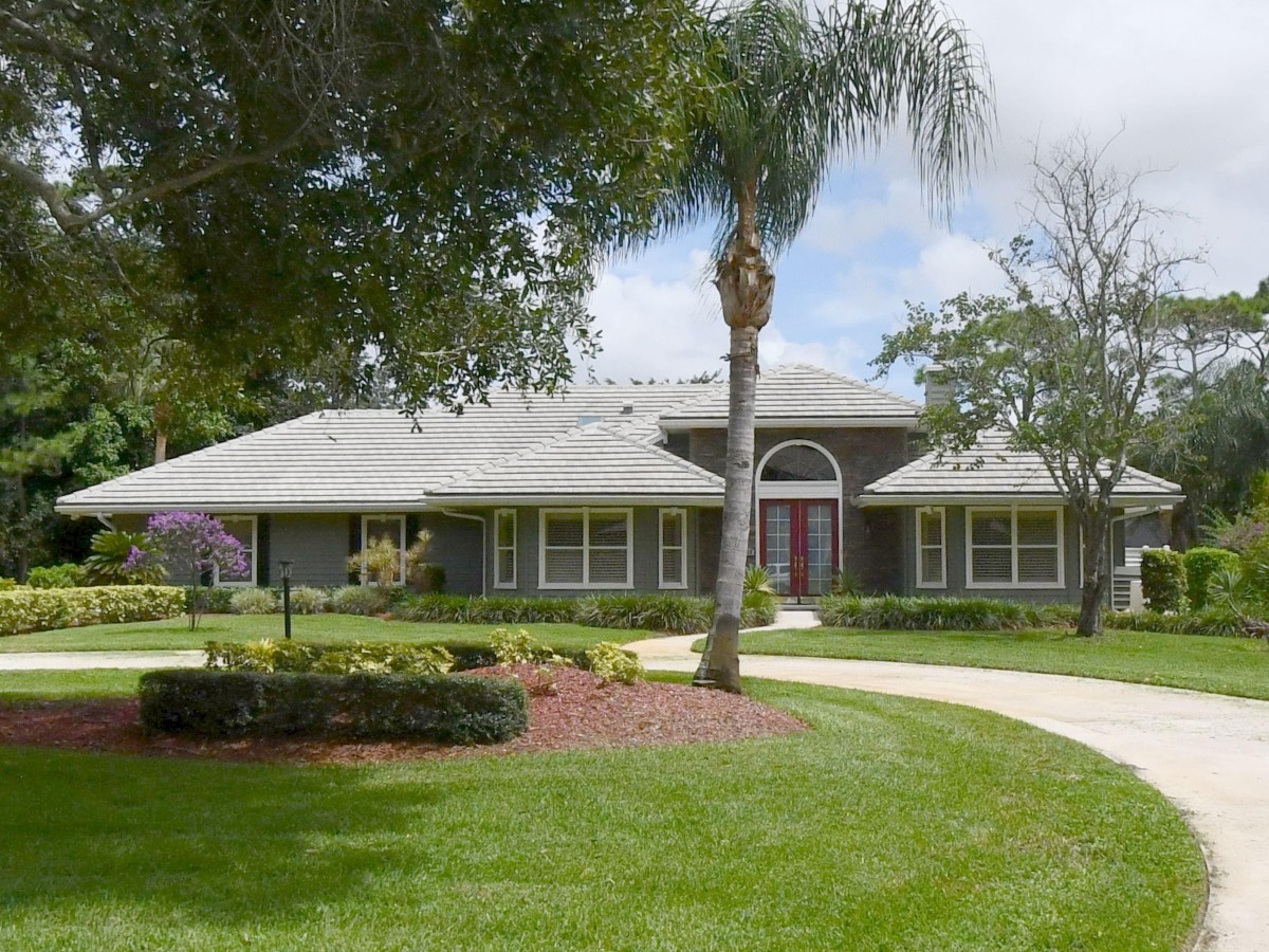 2001 Roof Replacement in Reserve Plantation, PGA Village, Port St Lucie with Entegra Flat Smooth Tile in Natural Gray