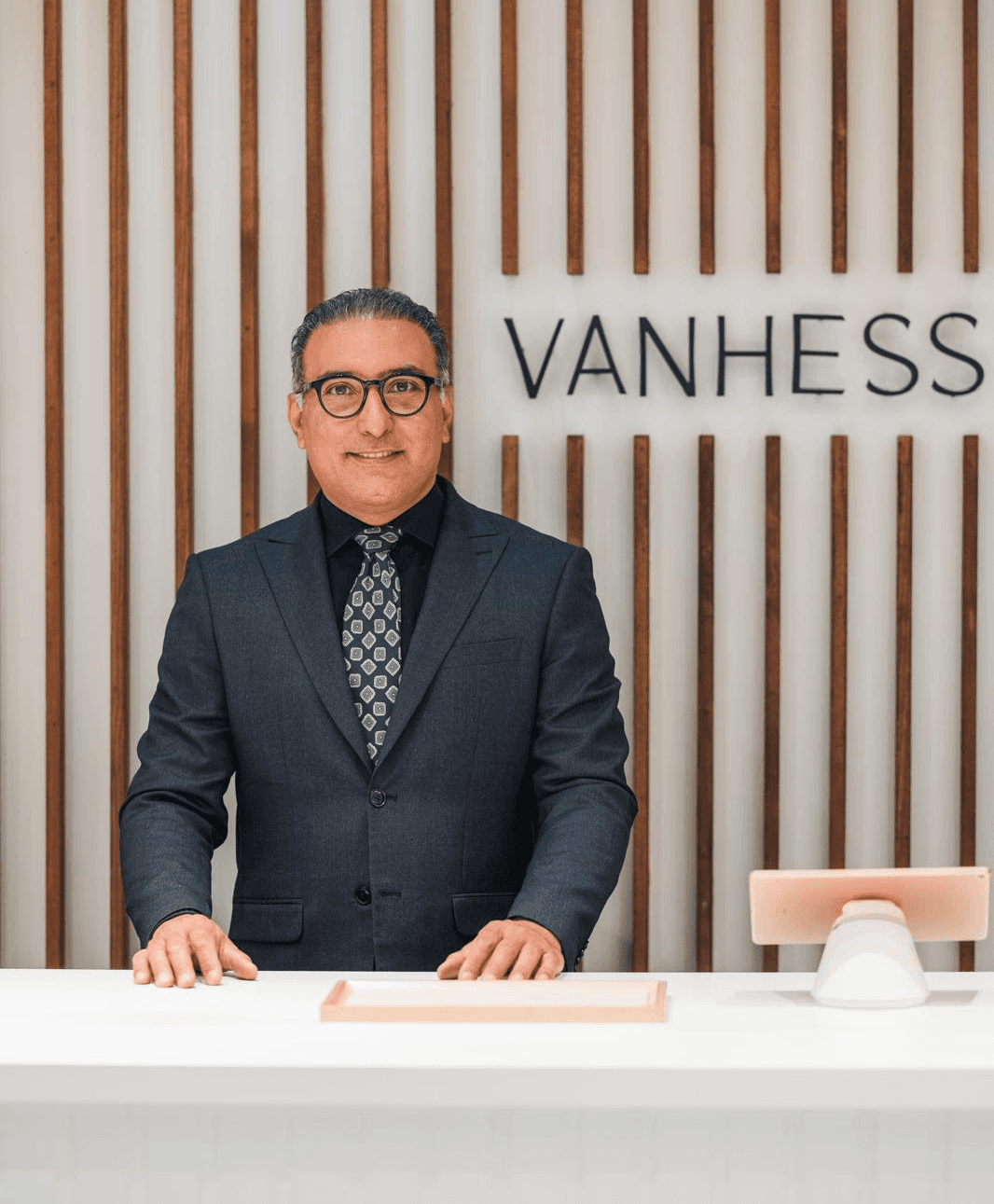 Mehran Rahbaran at Vanhess Jewelry in Coquitlam, British Columbia, welcoming clients to design custom lab grown and men’s engagement rings.