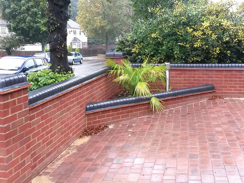 garden wall at front of house