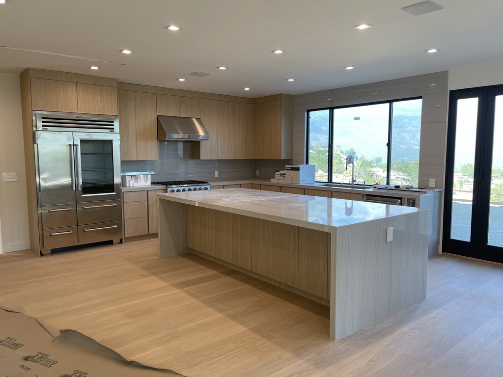 white washed white oak rift kitchen cabinetry modern big island gola no handles