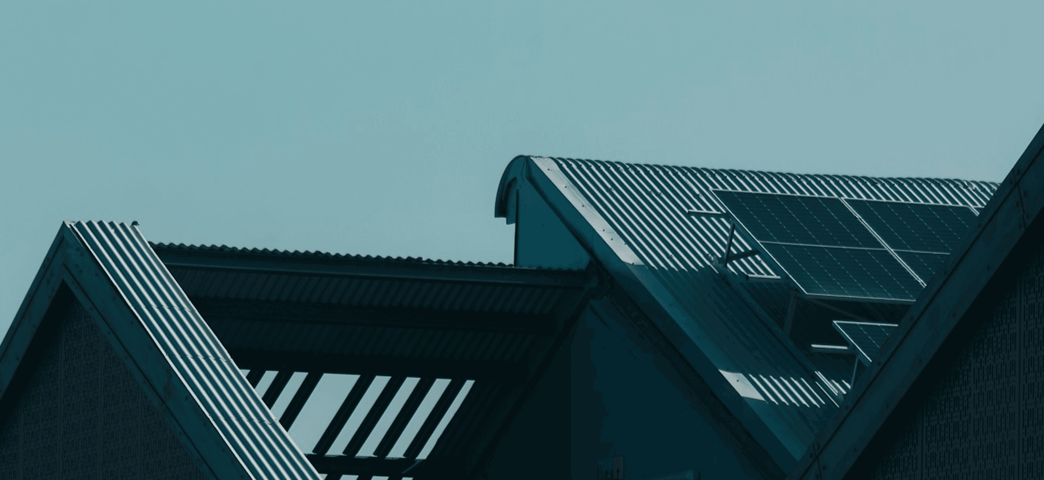 a close up of a roof with a blue tint
