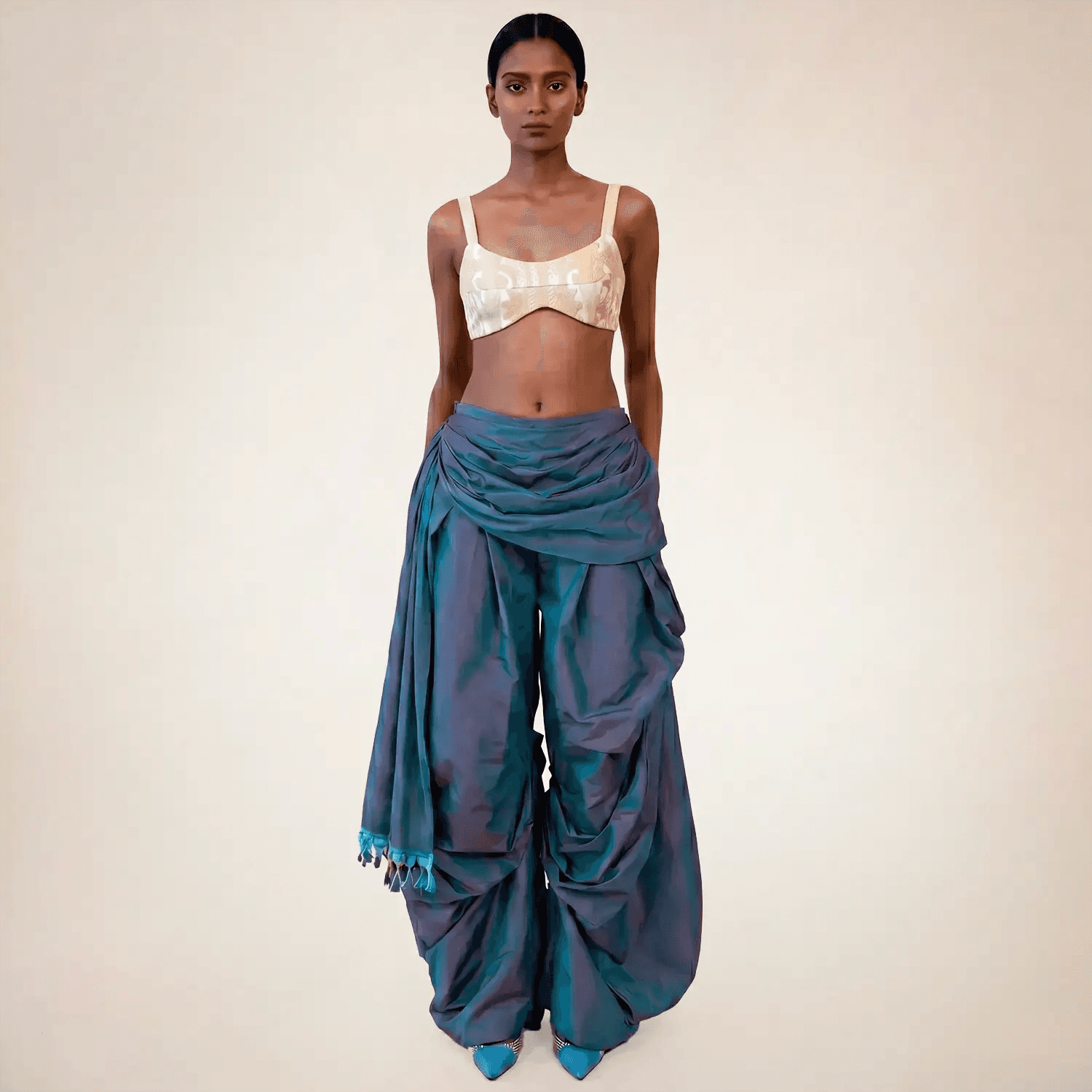 Antariya is a one of a kind drape pant, handcrafted in house from repurposed pure silk and saree borders. 