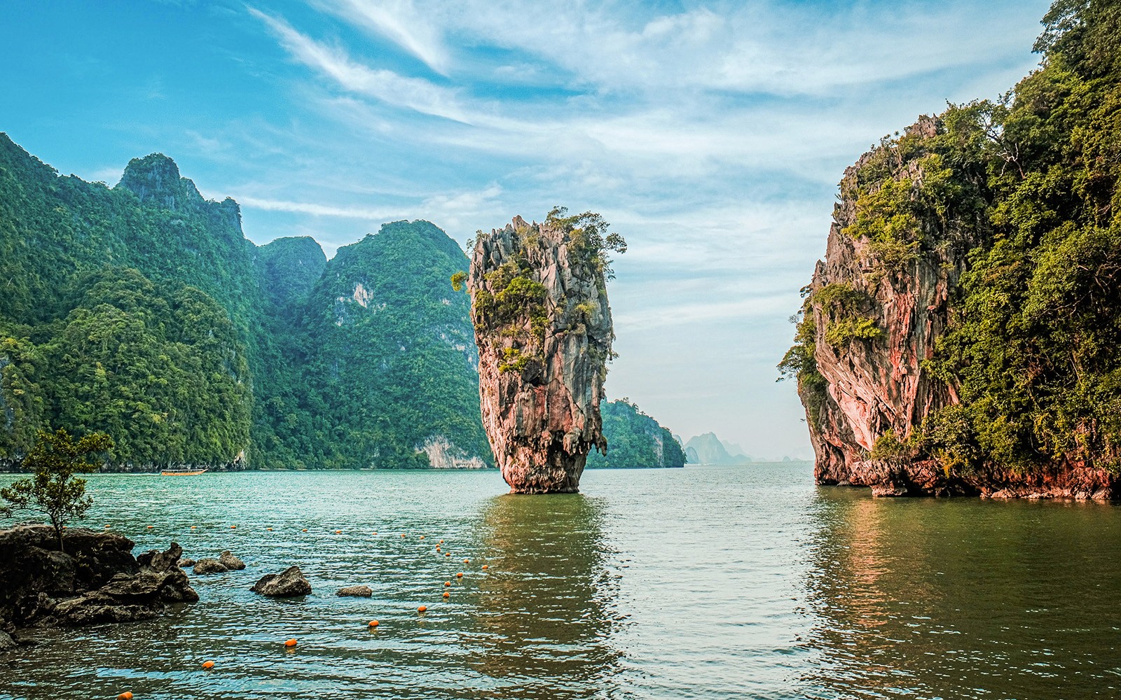 James Bond Island view from luxury catamaran in Phang Nga Bay, Thailand.