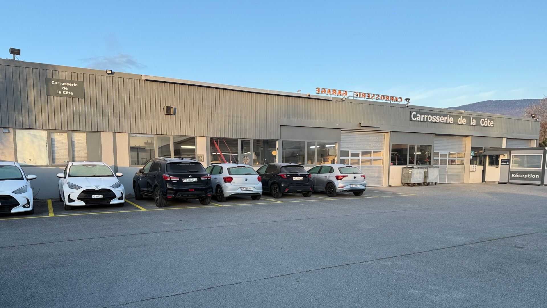 people sitting on chair in front of laptop computers