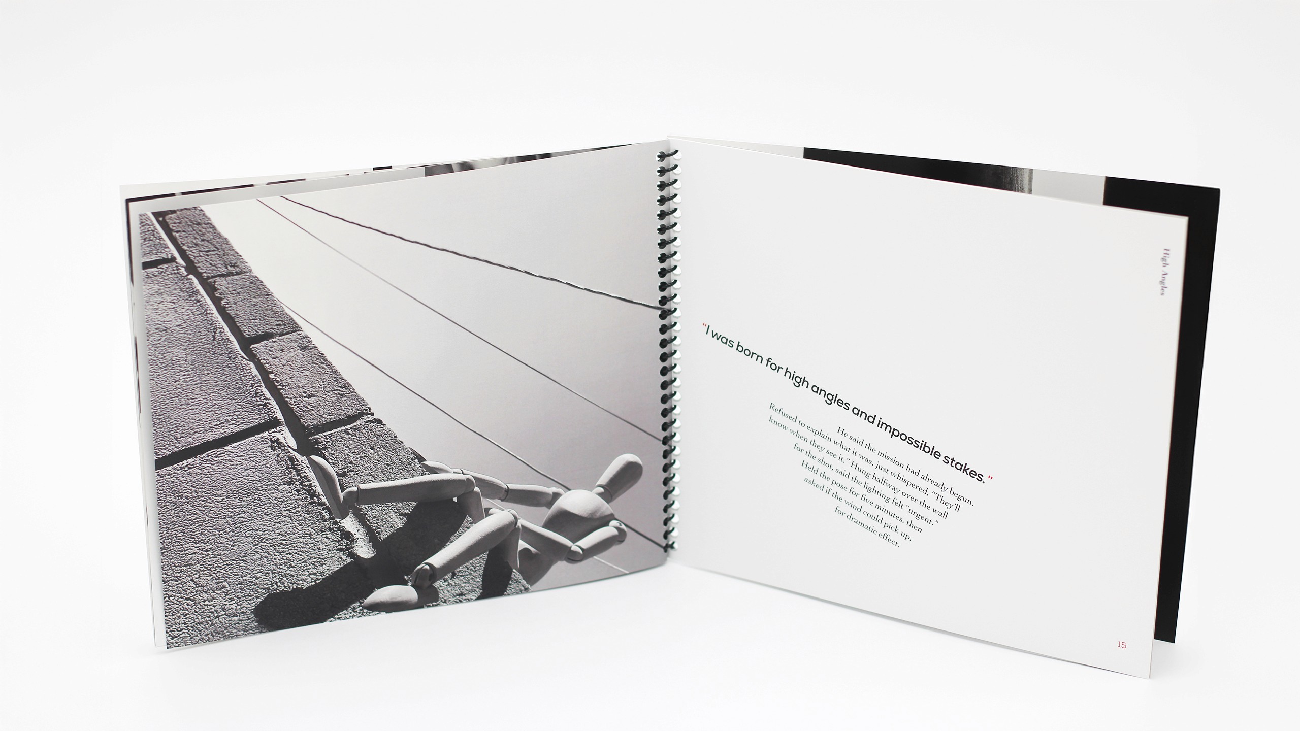 Publication spread. Left, black and white photograph of drawing mannequin sitting on a ledge. The shot is angled. Right, text with descriptio of image. Treated to follow elements from the image.