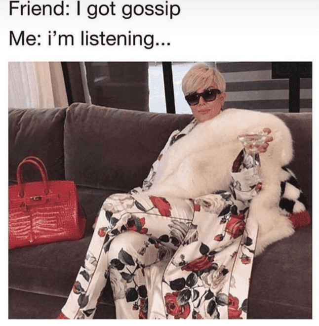 A ballerina with long hair throws her arms up