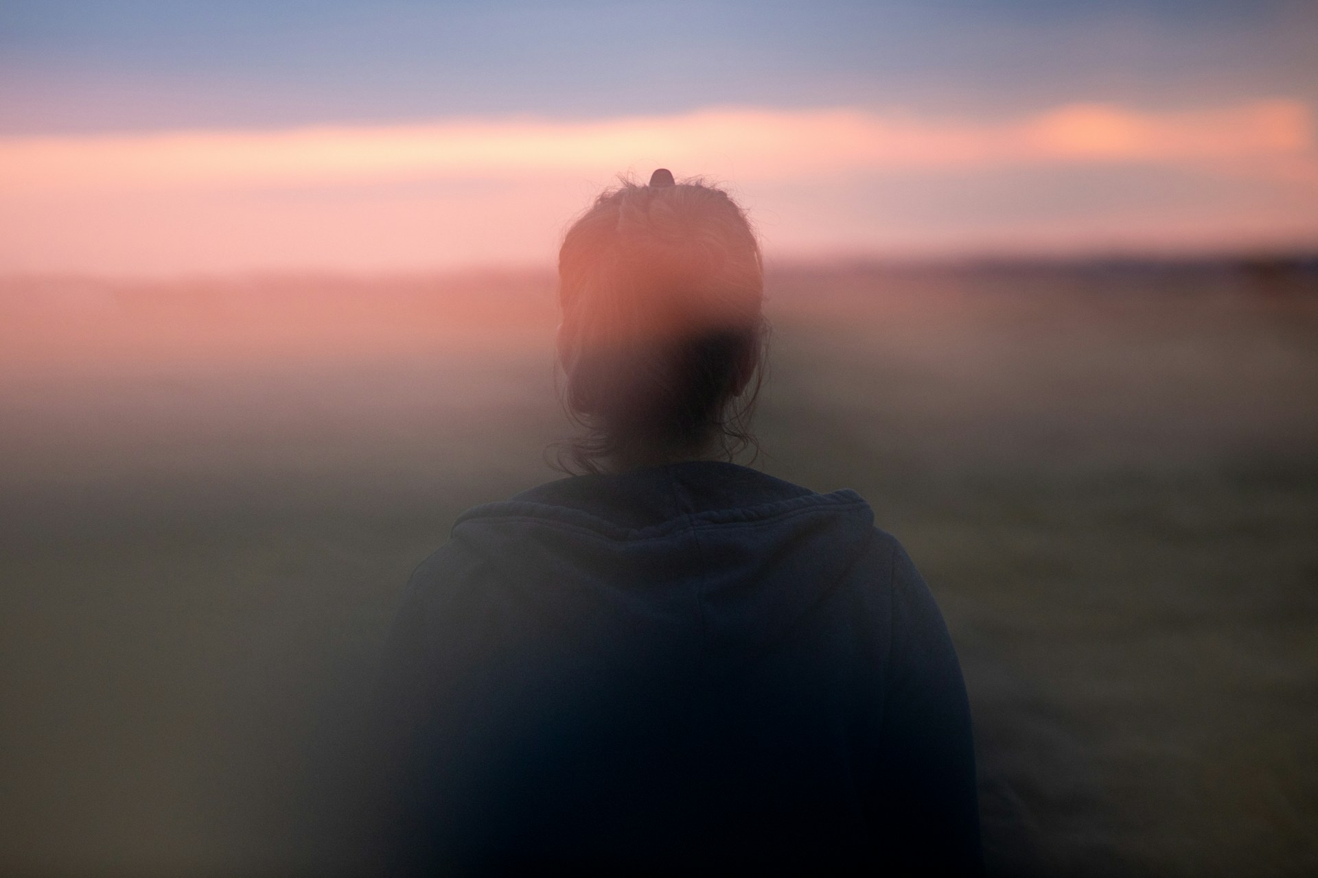 Back view of a solitary person
