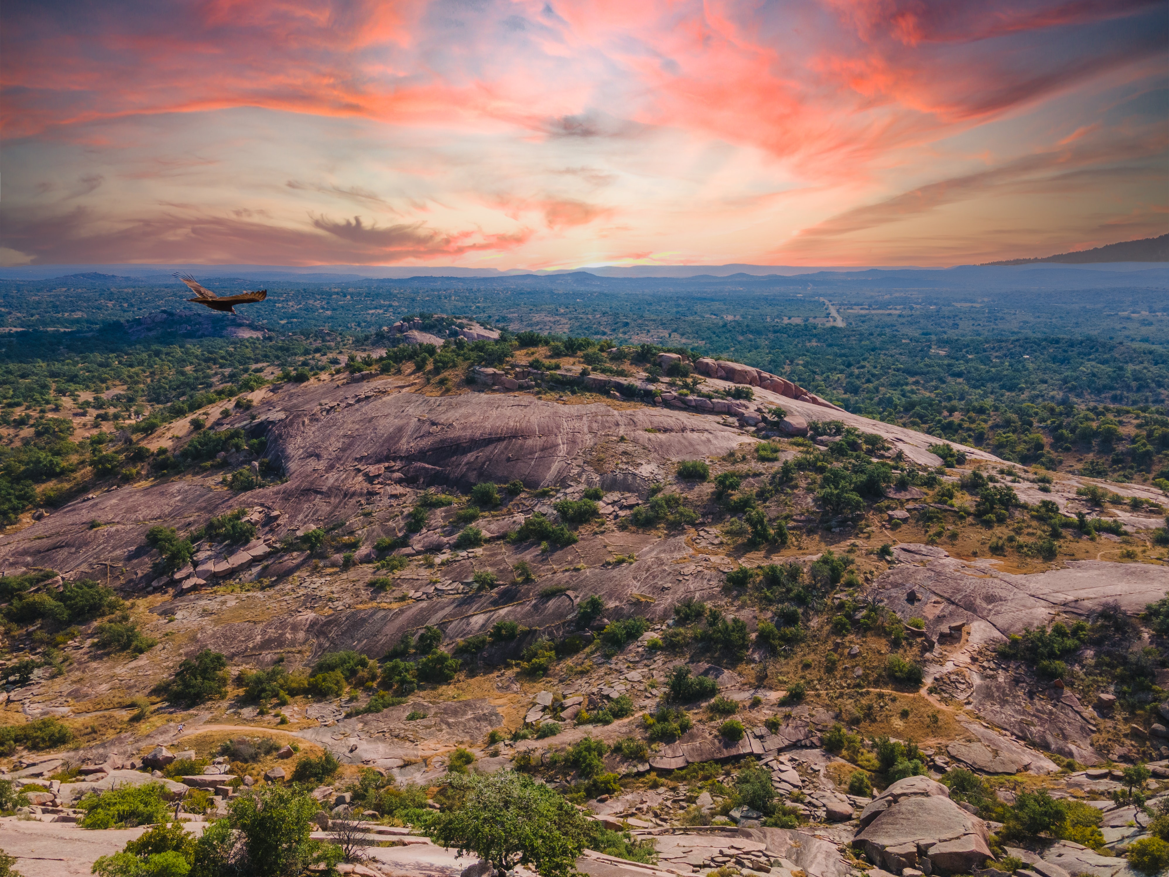 Vermillion sky over Enchanted Rock in Fredericksburg, TX