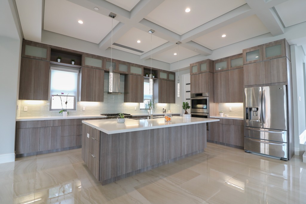 modern high ceiling kitchen with edgepulls 
