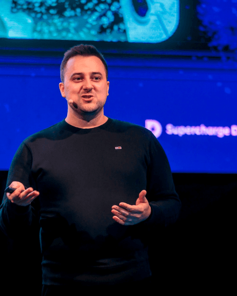 Supercharge Design team giving talks, mentoring, and connecting with the design community at conferences and workshops