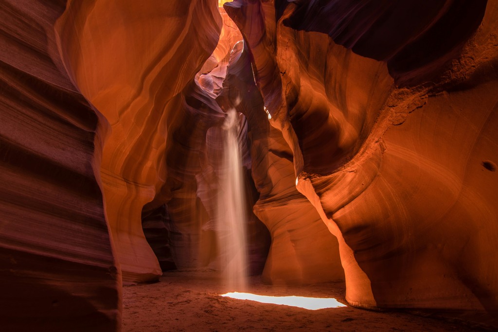 Antelope Canyon with light beaming through the rocks