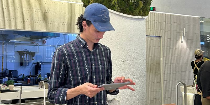 Daniel Fleischer, owner of Flint Café & Roastery, with a StoreHub POS