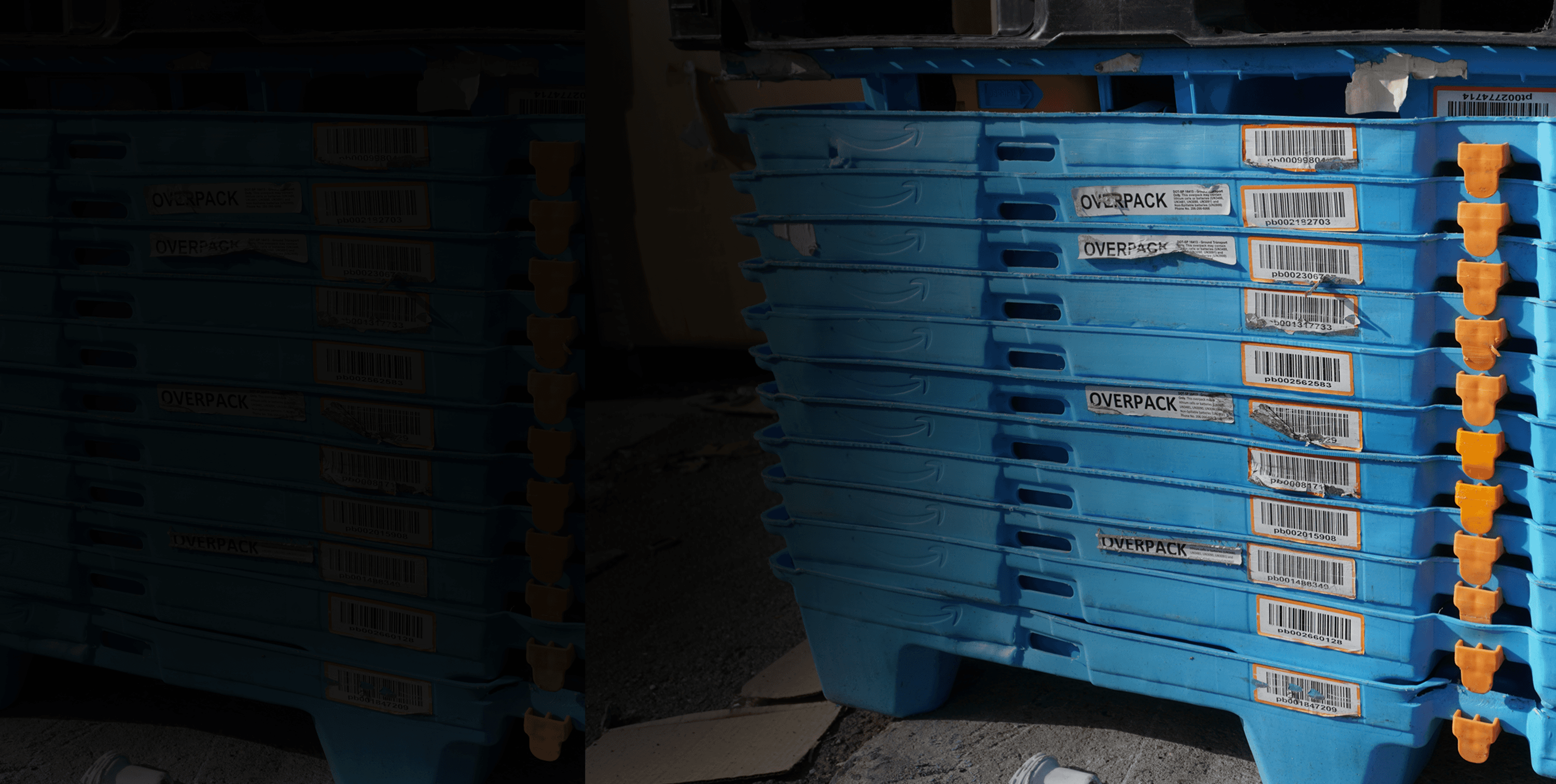 Stacked blue reusable plastic crates with worn and peeling surface-applied labels