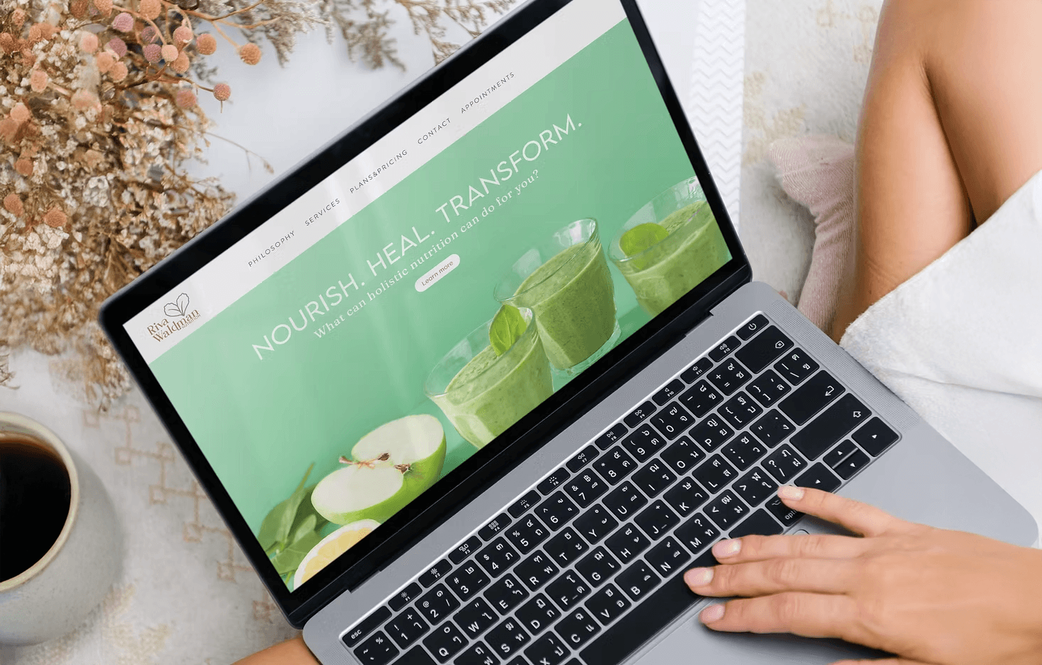 laptop with webiste homepage