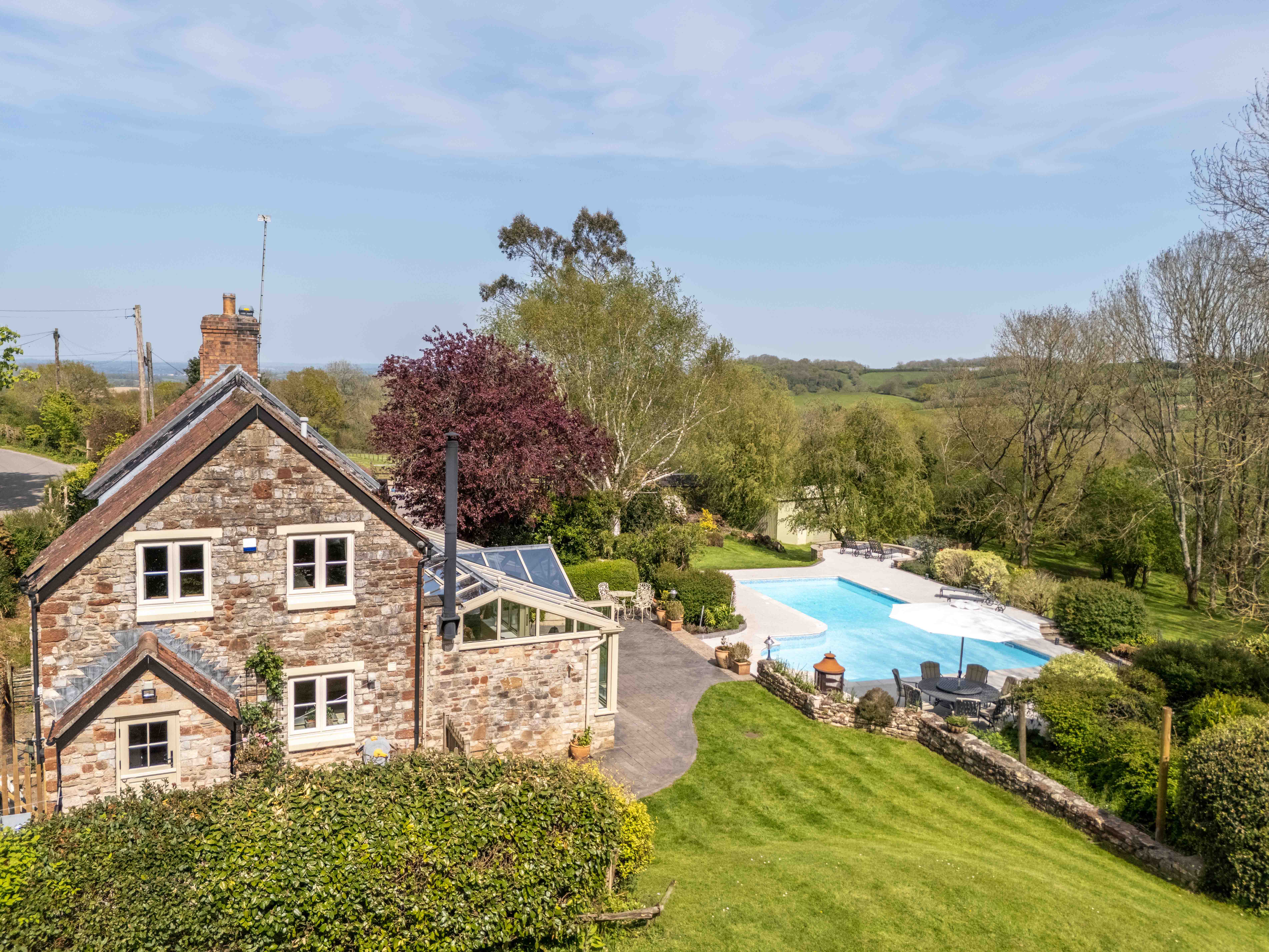 terrace and lawn with panoramic countryside views