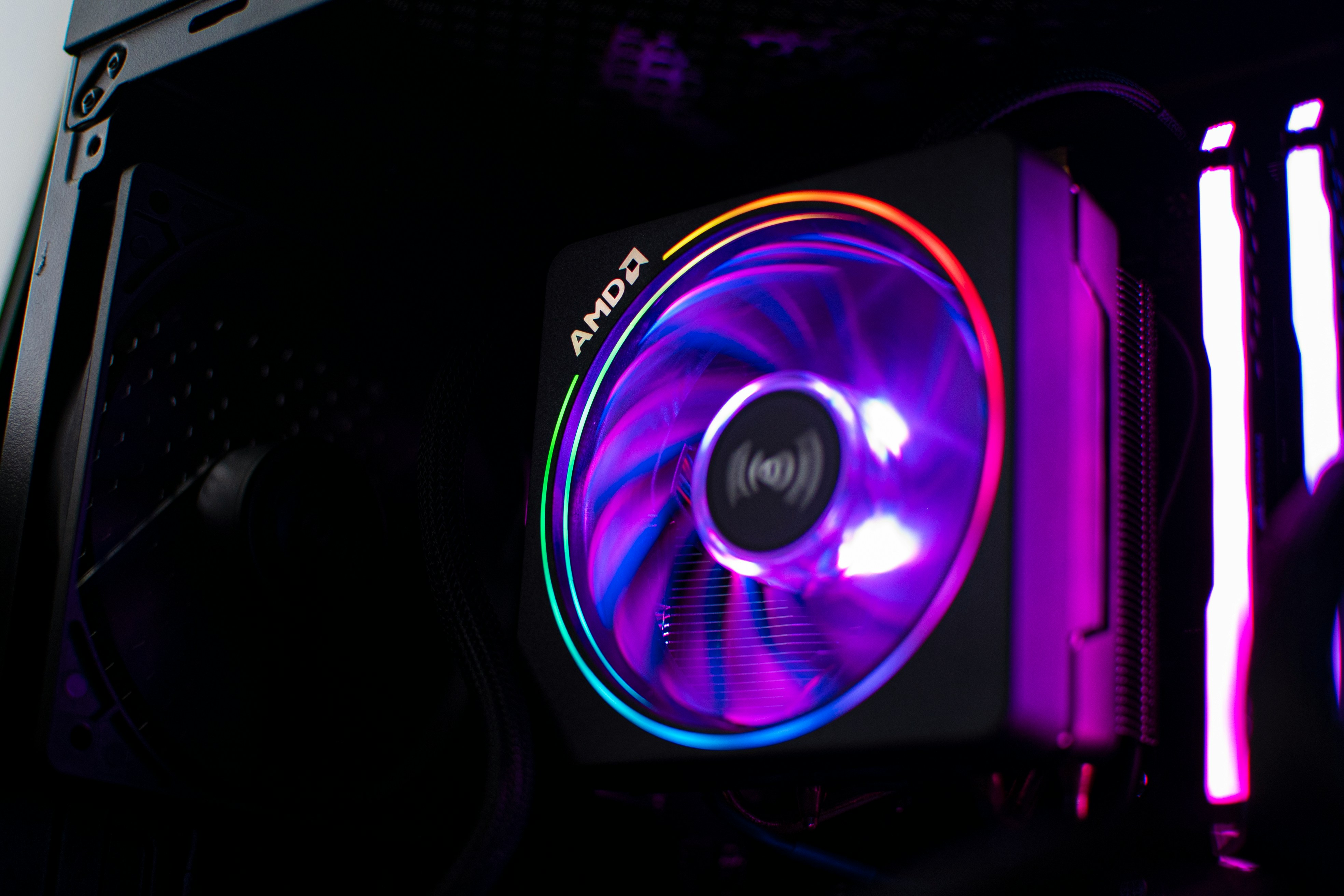 a close up of a computer case with a fan