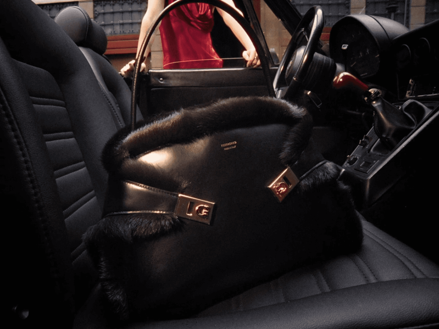 Busy city street at night with glowing billboards