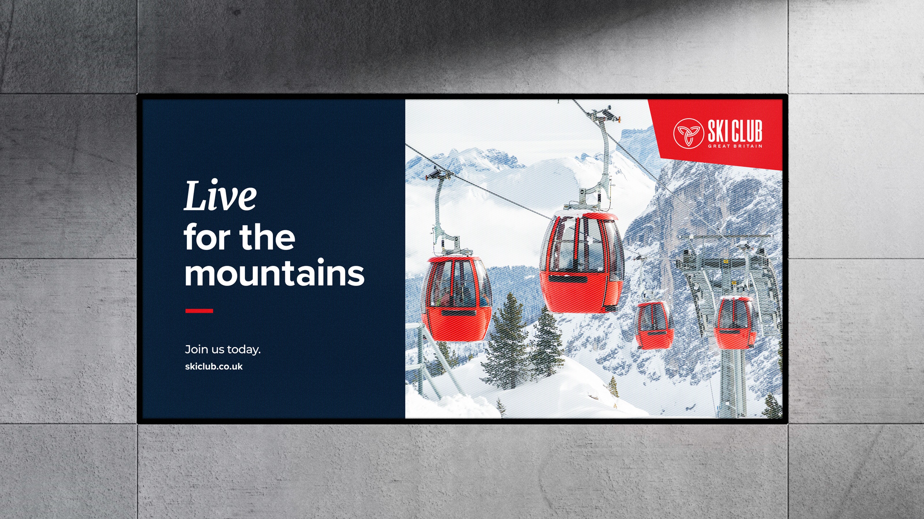 Black rectangular projecting sign mounted to a brick exterior wall, displaying “AVANT GALLERY” in light grey uppercase against the shadows and texture of the bricks.