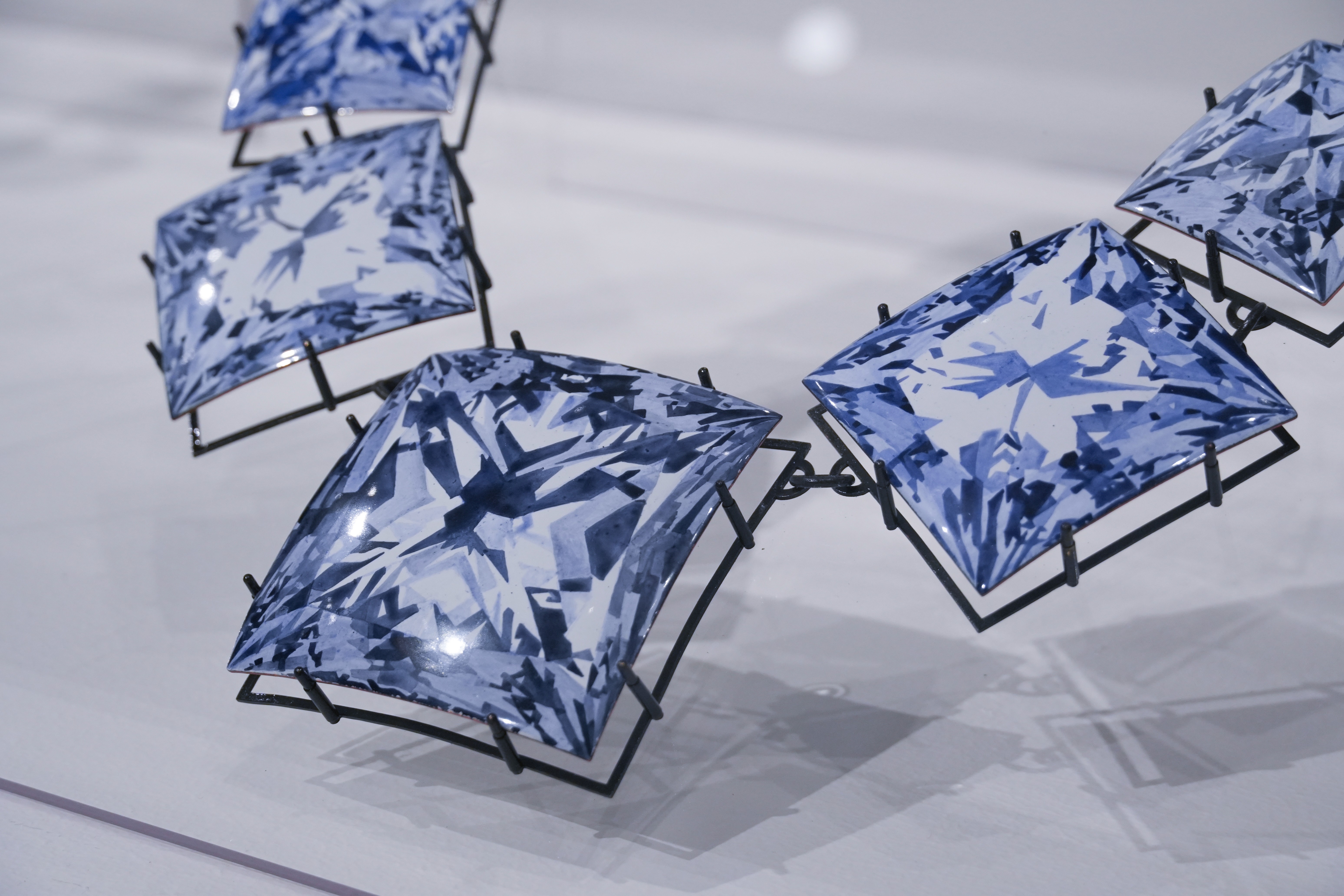 Close up of Gem by Yuxin Song, painted enamel on copper, contemporary jewelry necklace, selected for SCHMUCK 2026 Munich