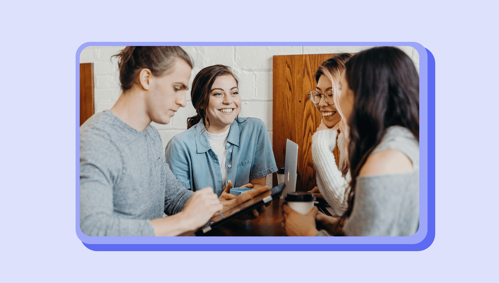 Group of people actively chatting with each other in a community setting.
