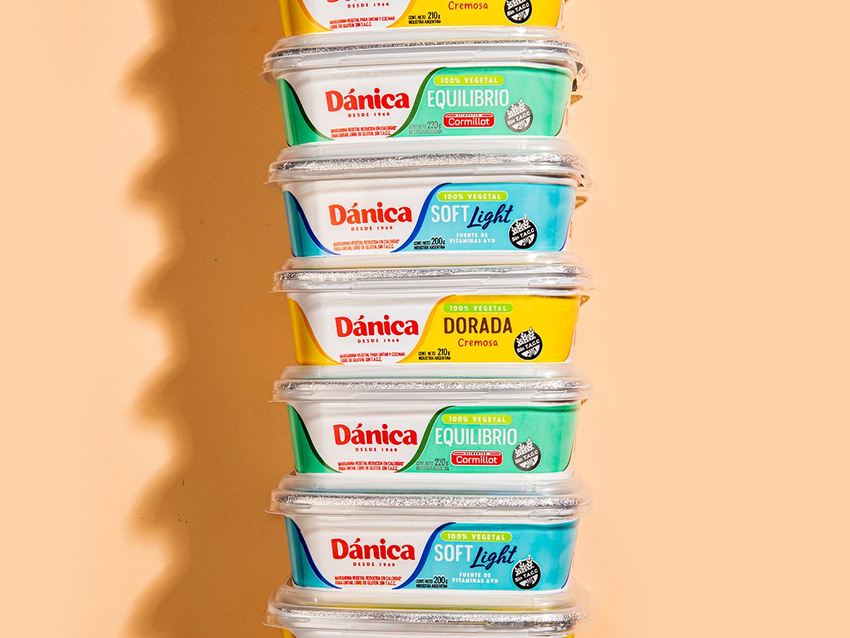 Rooftops of a coastal town with the sea in background