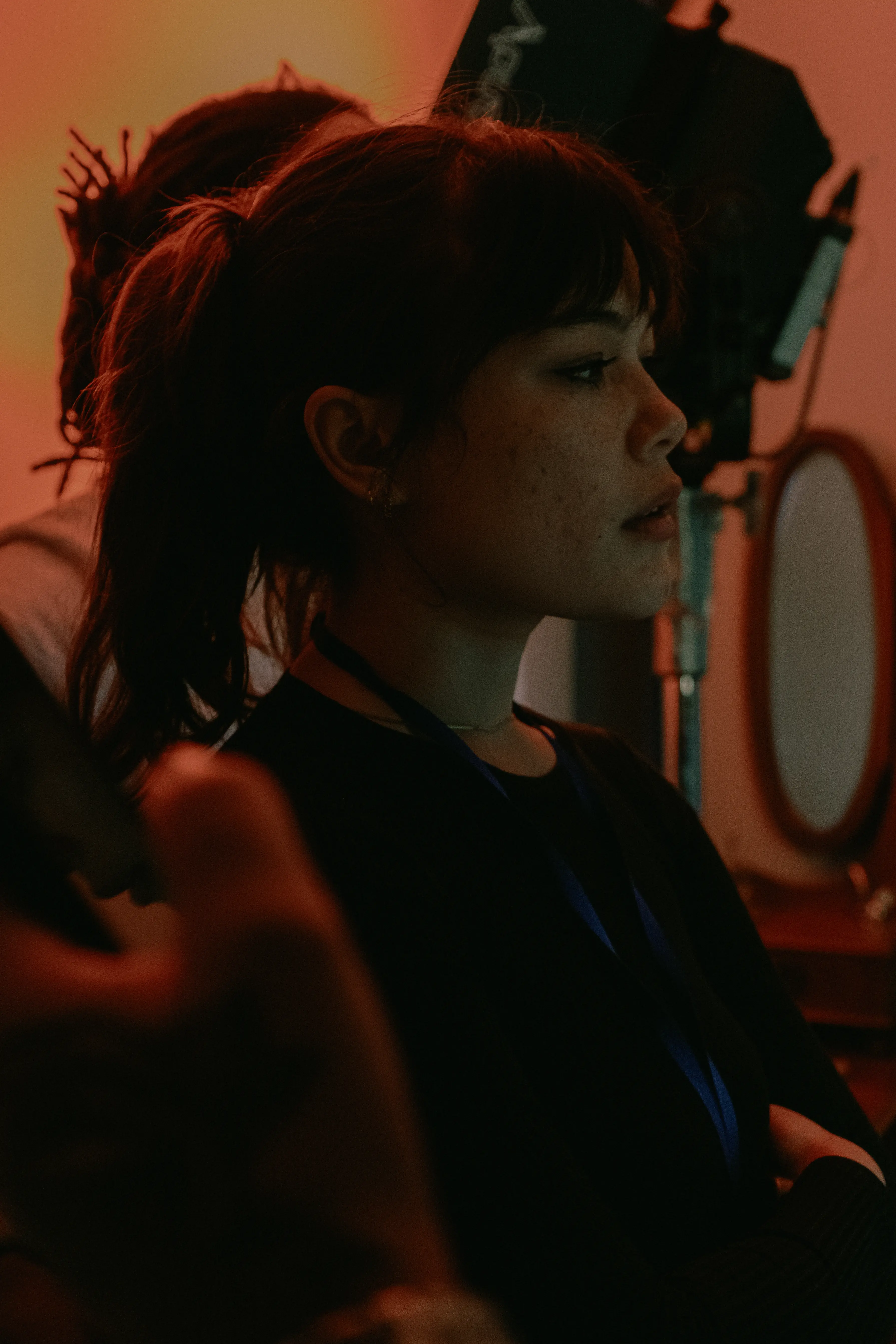 A girl behind the scenes of an X ANIMA shoot