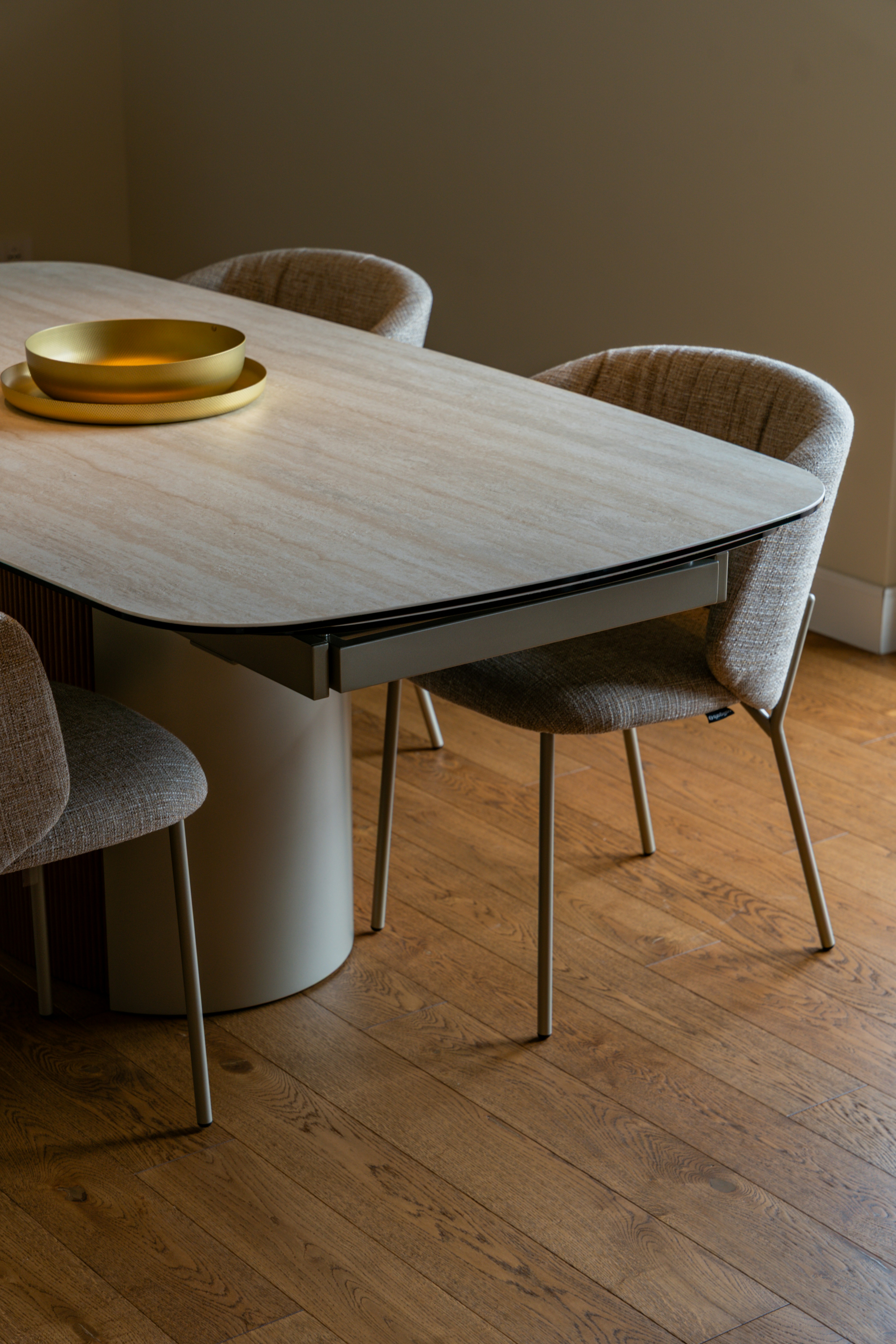Dining table and chairs create a modern interior.