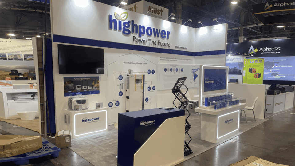 RE+ energy booth project with clean power product displays, branded backwall, and technical demo stations