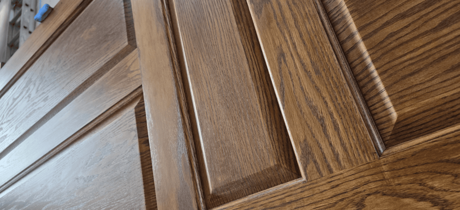 close-up-of-a-handcrafted-arched-wooden-door