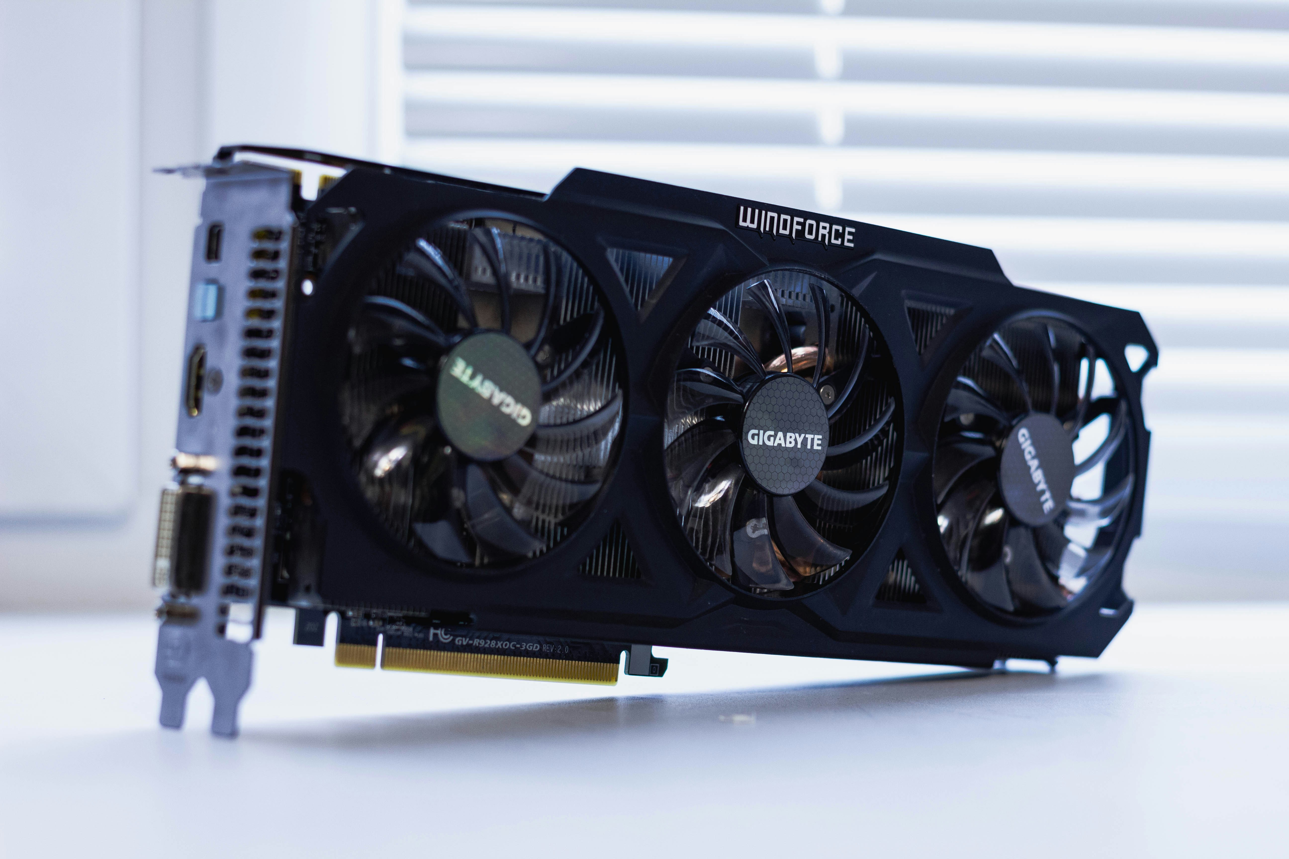 Close-up photo of a Gigabyte Windforce graphics card with triple fans, used to illustrate GPU hardware for 3D rendering.