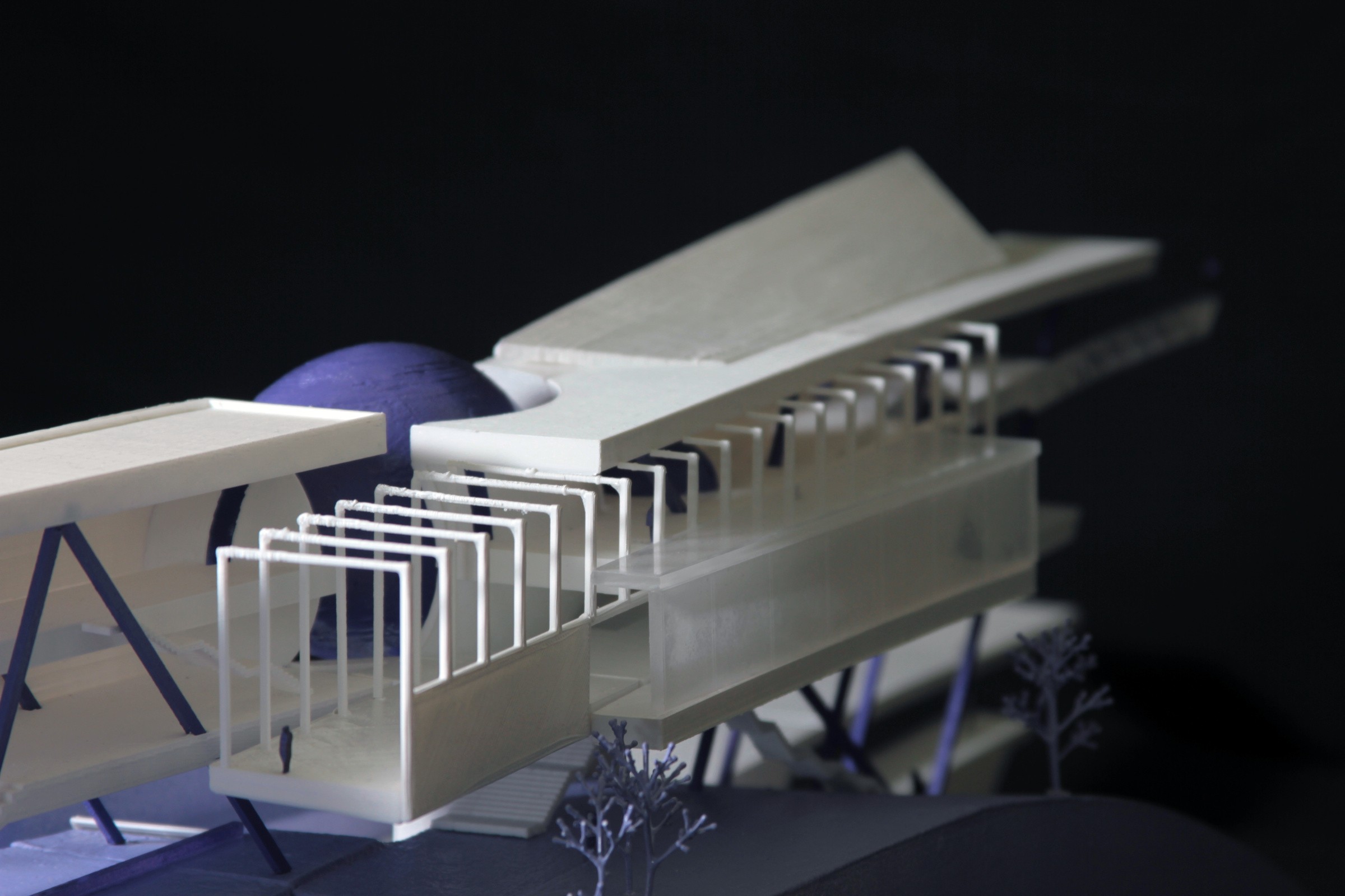 Close view of the precursor model with repeated white frames, an elevated platform and a purple spherical volume.