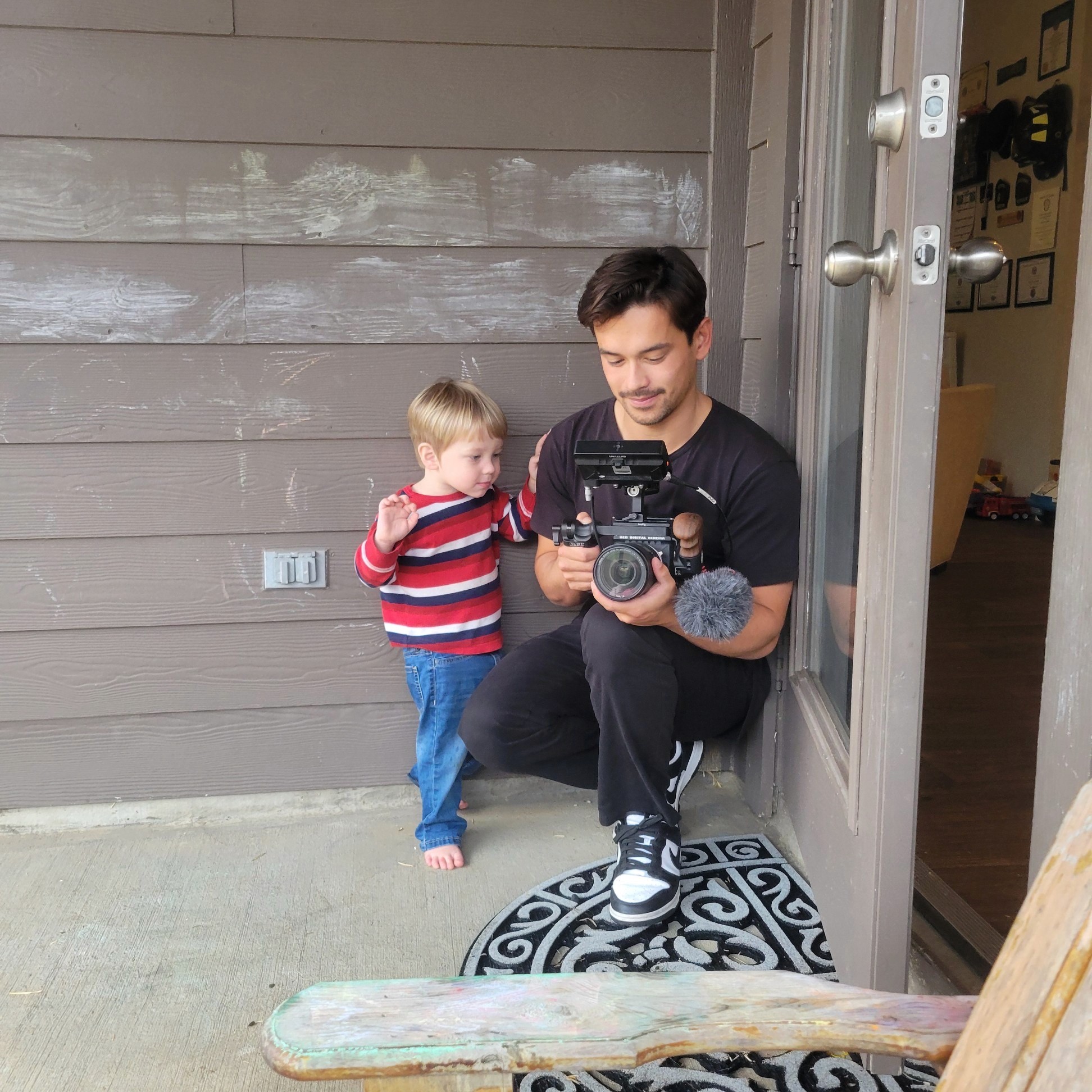 baby interacting with camera guy