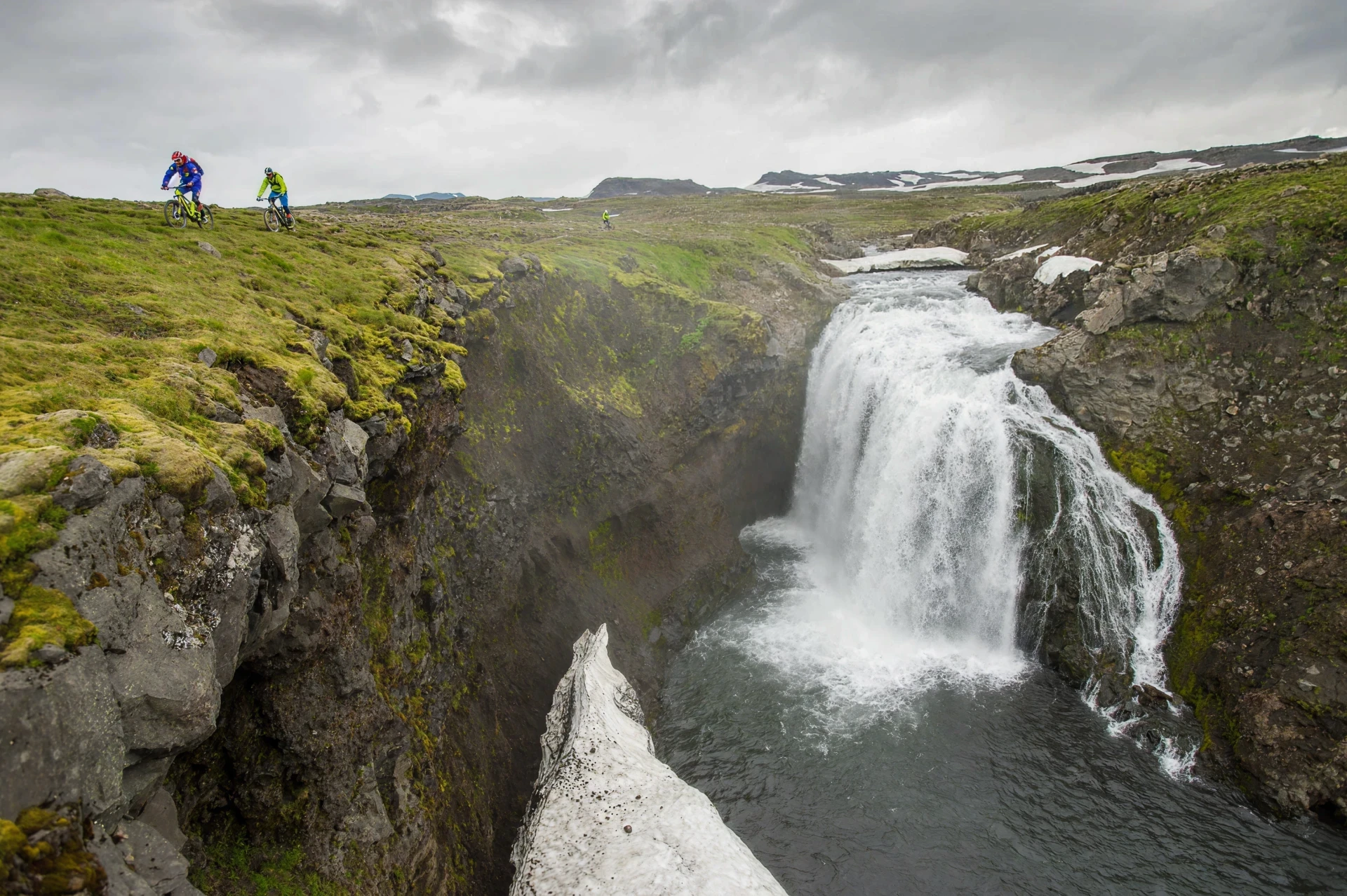 Riding MTB near waterfall