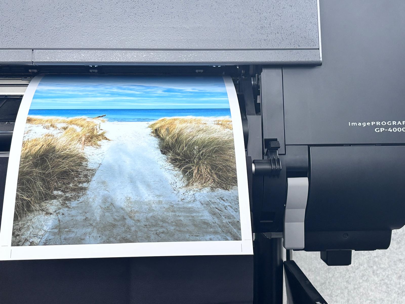 printer printing a large format landscape fotograph